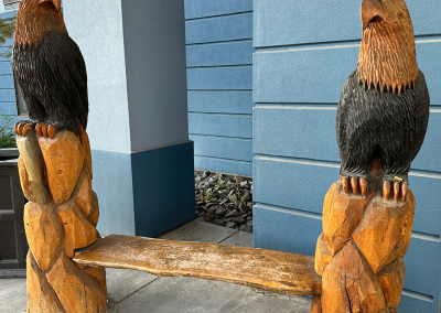 Seat surrounded by 2 carved wooden eagles at hotel in Fairbanks, Alaska